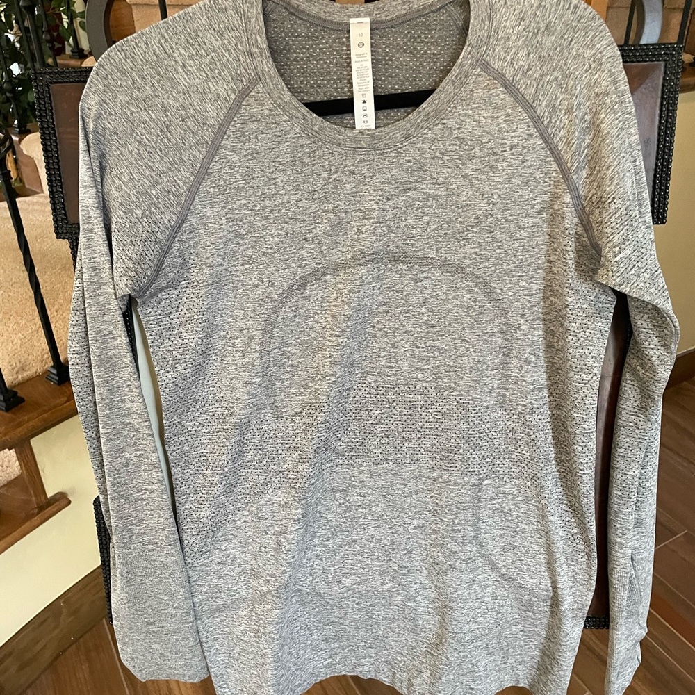 Lululemon long sleeved shirt.  New without tags.  Never worn!